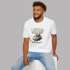 Man wearing a white t-shirt with 'Lucas Electrical Works' design on a gray background