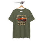 Military green t-shirt with car graphic and text on a hanger against a white background