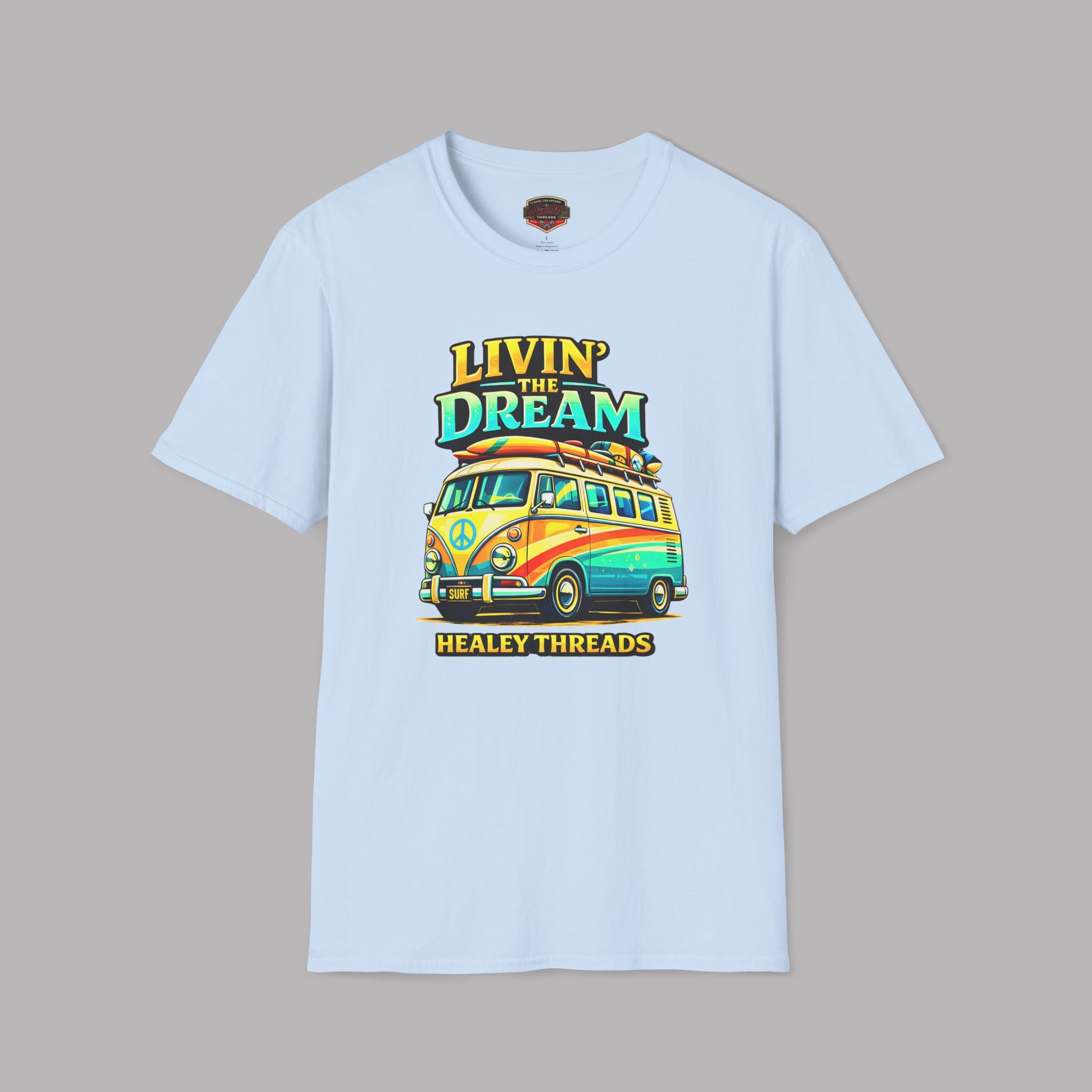Light blue t-shirt with a colorful van graphic and 'Livin' the Dream' text on a gray background