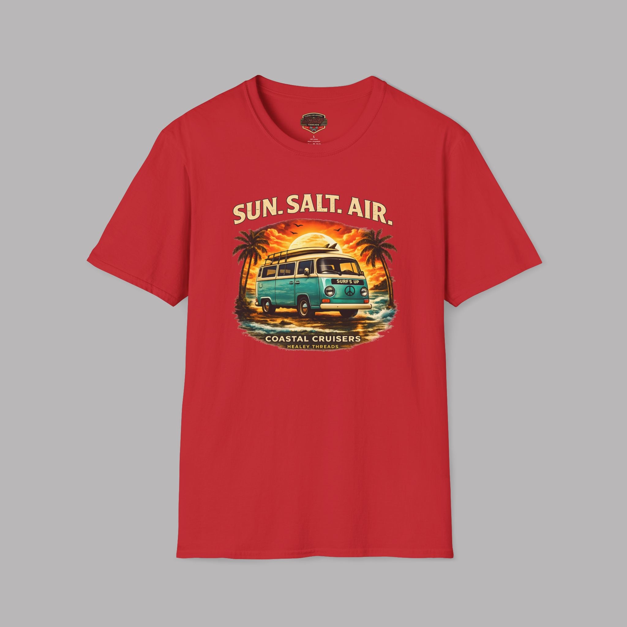 Red t-shirt with a graphic design of a van, palm trees, and 'Sun, Salt, Air' text on a gray background.