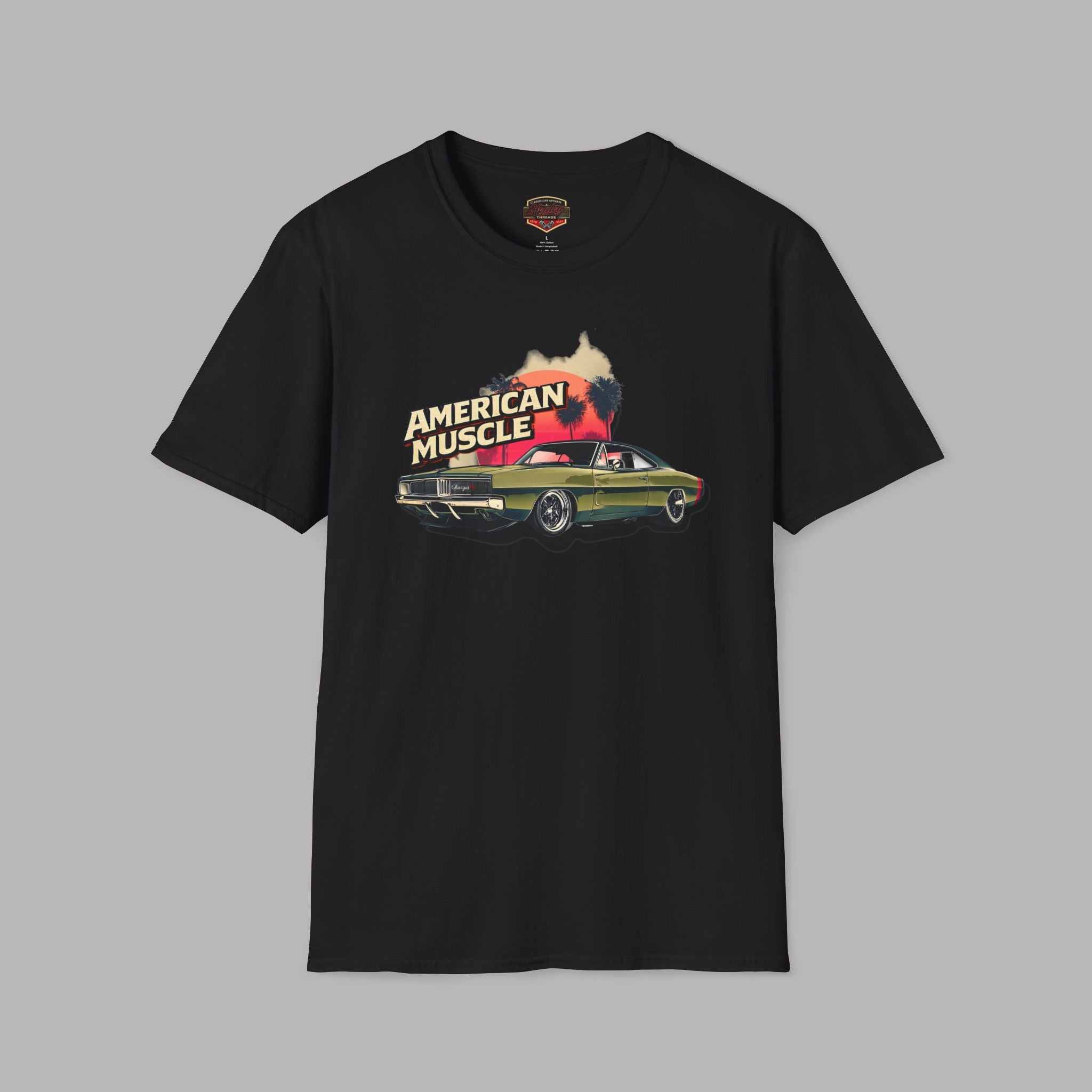 Black t-shirt with 'American Muscle' graphic design on a gray background