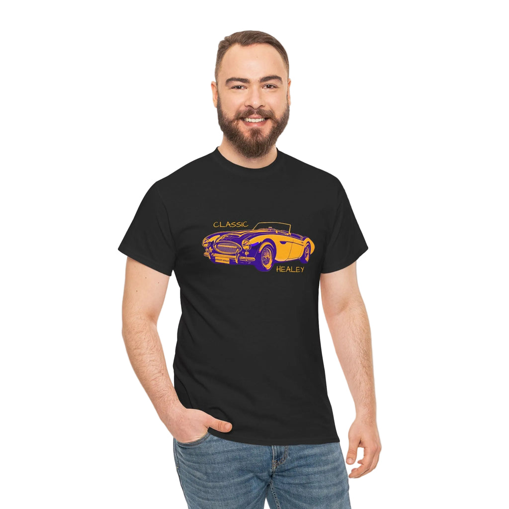 Man wearing a black t-shirt with a yellow and purple car design on a white background