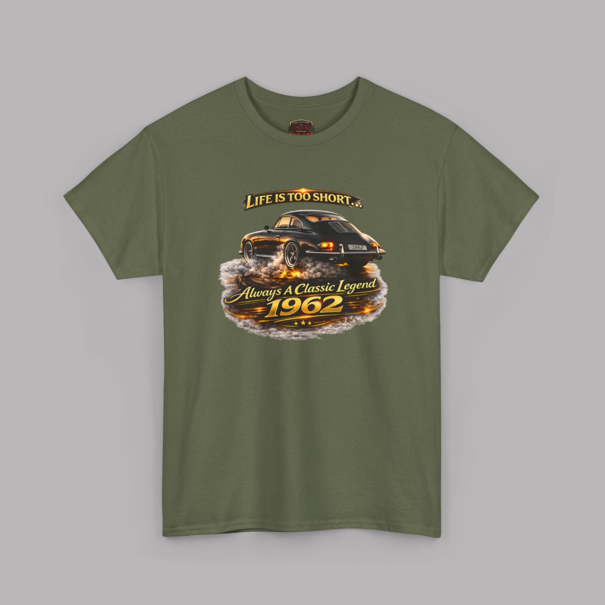 Short-sleeve military green t-shirt featuring a graphic print of a classic car with flames and the text 'Life is too short to be ordinary. Always be a classic legend 1962'.