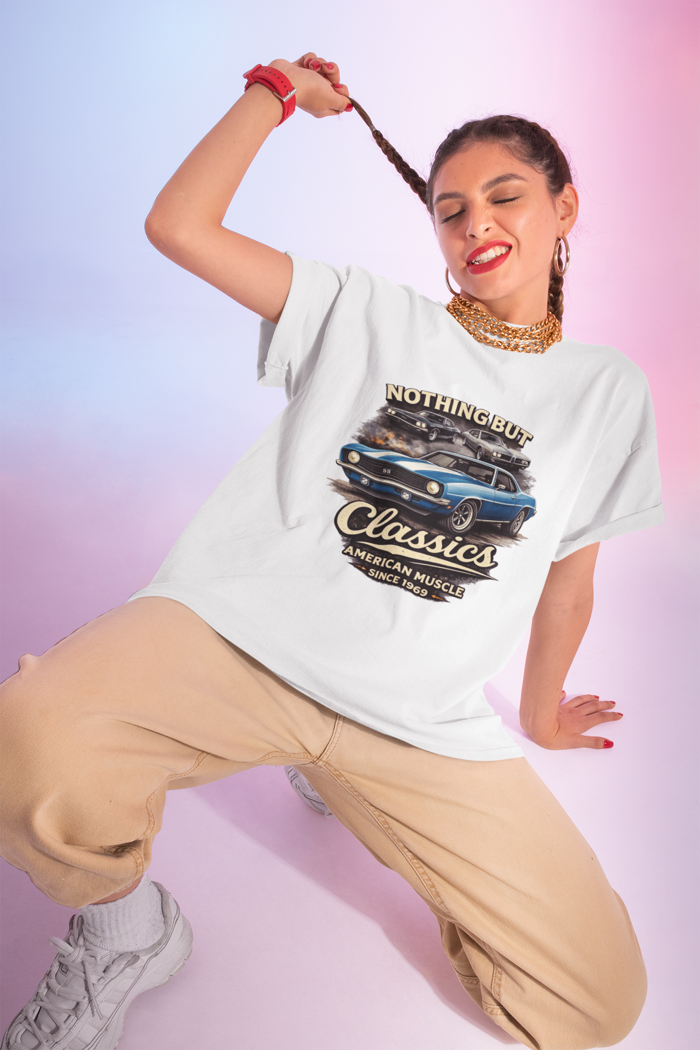 Woman wearing a white t-shirt with a graphic design on a gradient background