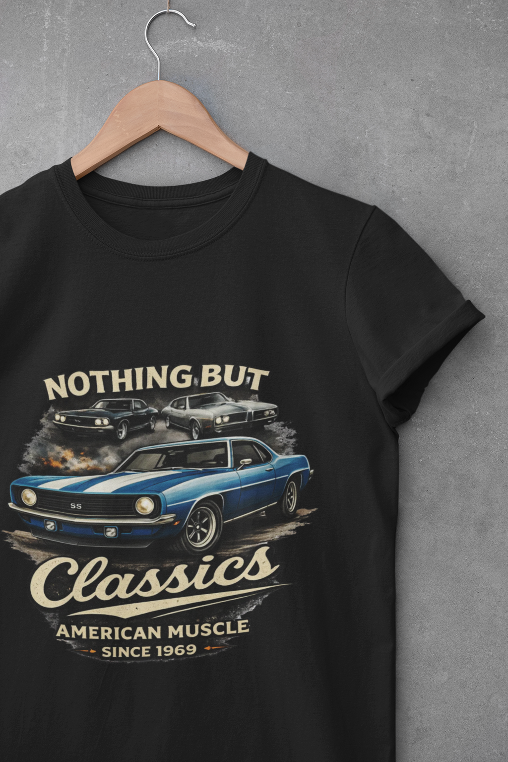 Black t-shirt with car graphic and text on a white background
