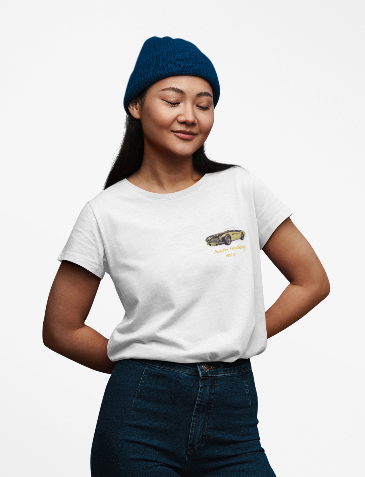 Girl wearing a white t-shirt with a small graphic on a white background