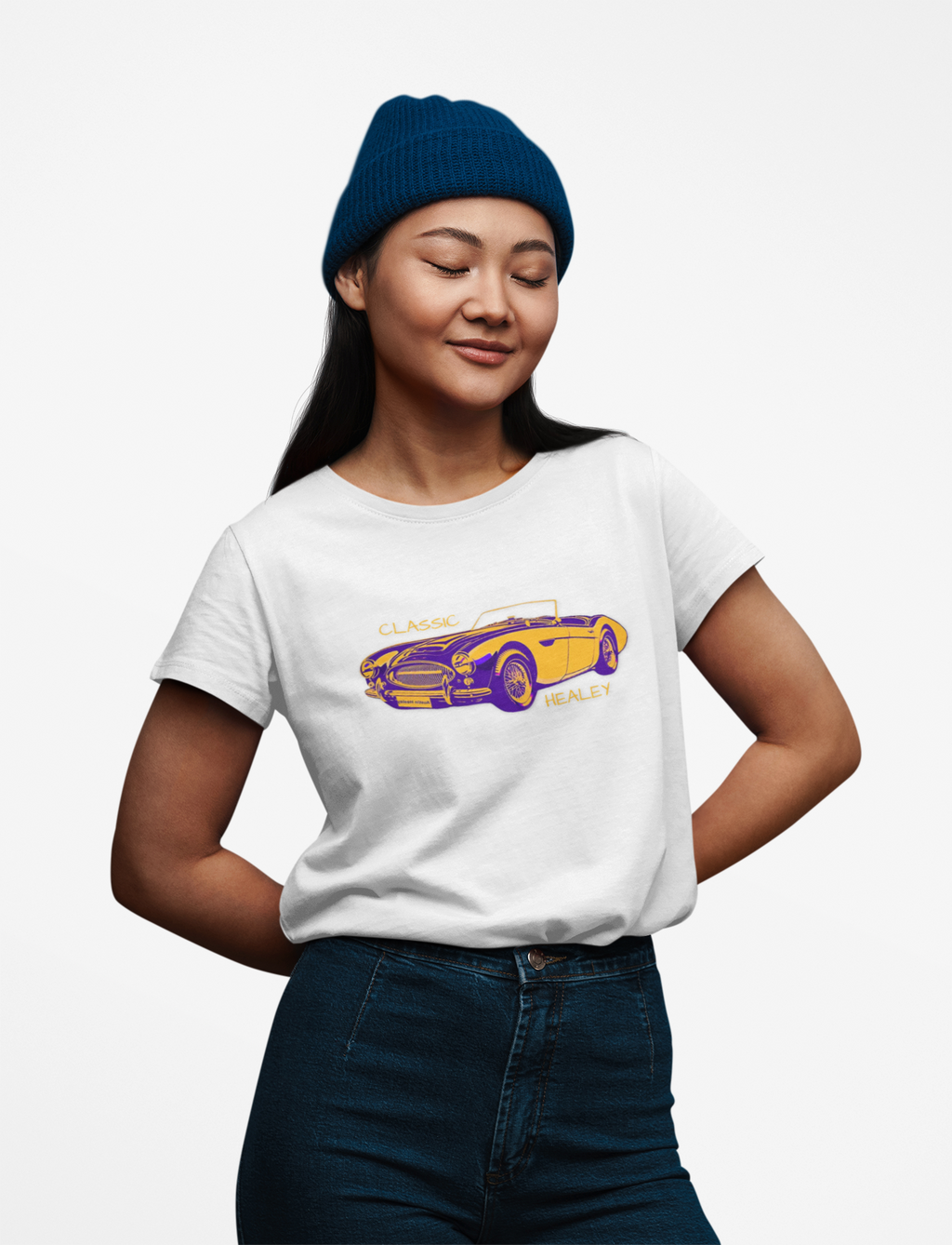 Girl wearing a white t-shirt with a purple car graphic on a white background