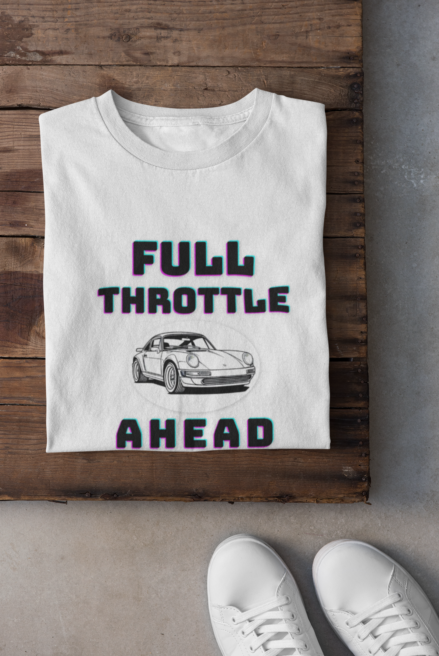 White t-shirt with 'Full Throttle Ahead' graphic on a wooden surface