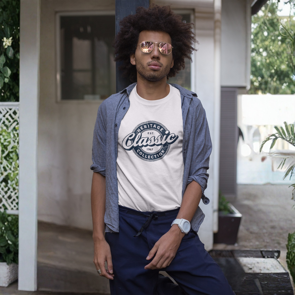 Man wearing a white t-shirt with text, blue shirt, and sunglasses outdoors.
