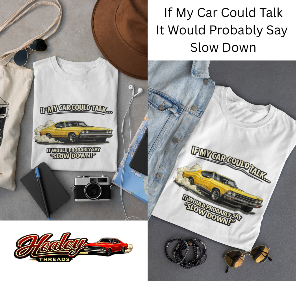 White t-shirts with car graphic and text 'If My Car Could Talk It Would Probably Say Slow Down' on a gray surface with accessories.