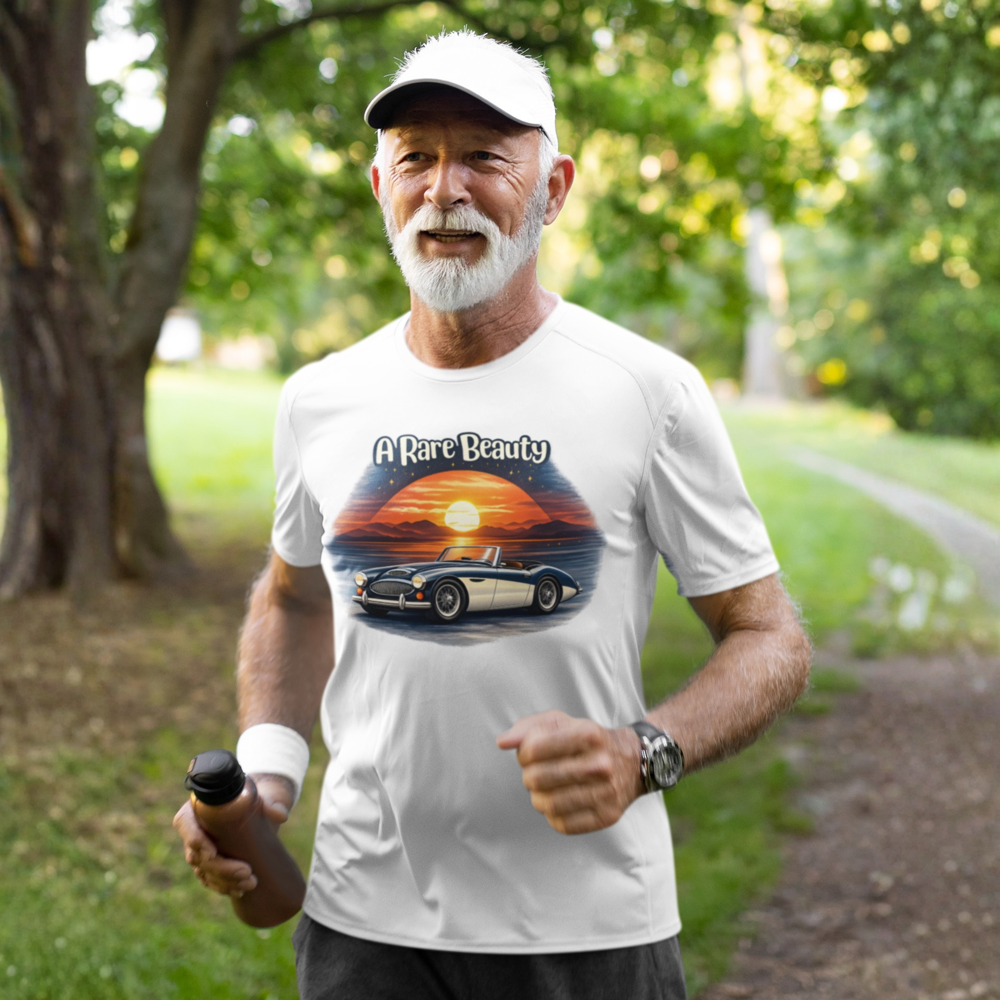 Man running outdoors wearing a white t-shirt with a Healey car design and text.