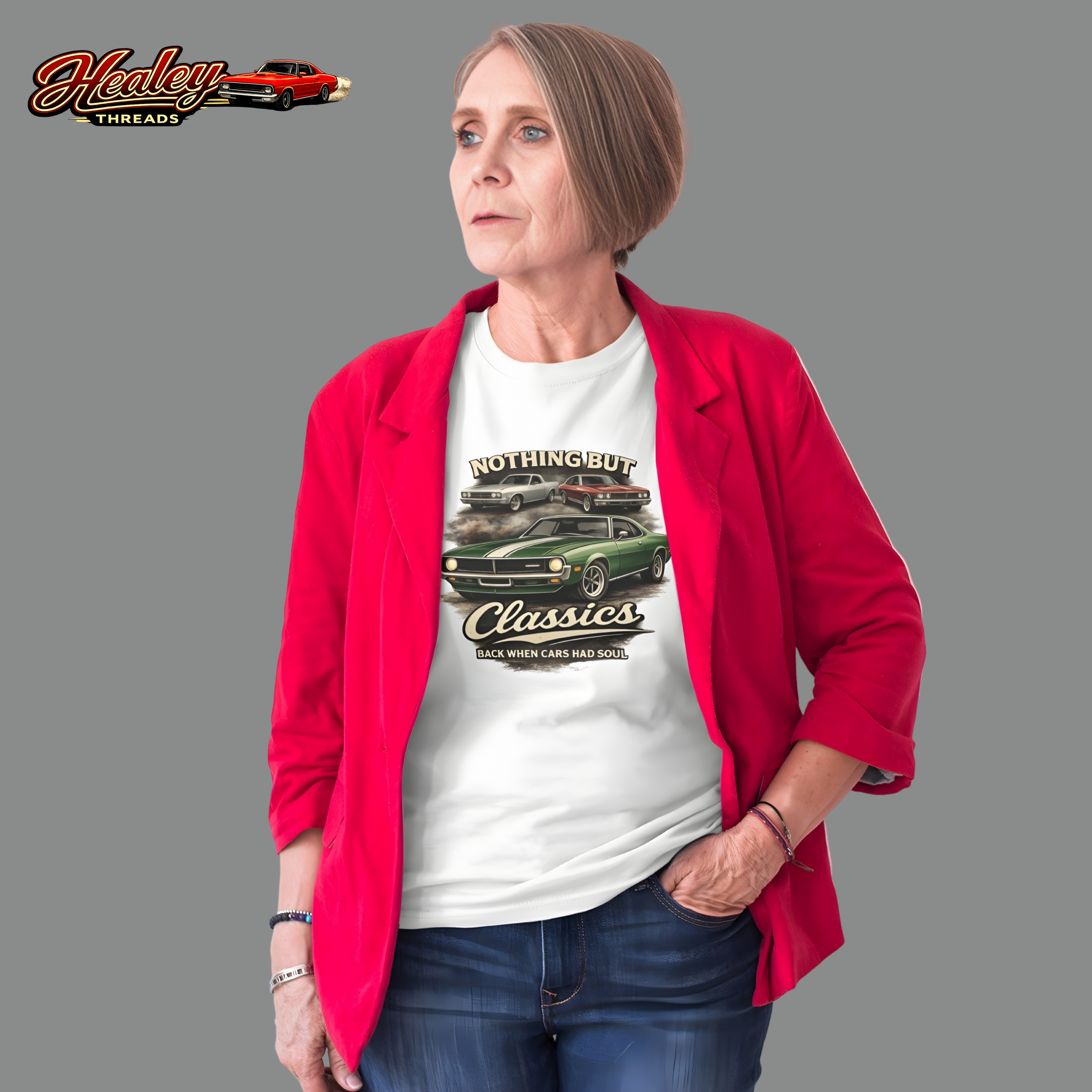Woman wearing a white t-shirt and red jacket with classic car graphic and text on a gray background