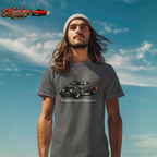 Man wearing a gray t-shirt with a vintage hot rod graphic against a blue sky.