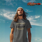 Man wearing a gray t-shirt with a vintage vette graphic and text against a blue sky, Healey Threads logo visible.