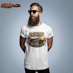 Man wearing a white t-shirt with a classic car graphic design and text, standing against a plain background.