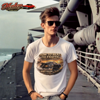 Man wearing a white t-shirt with a classic car graphic design on a ship deck.