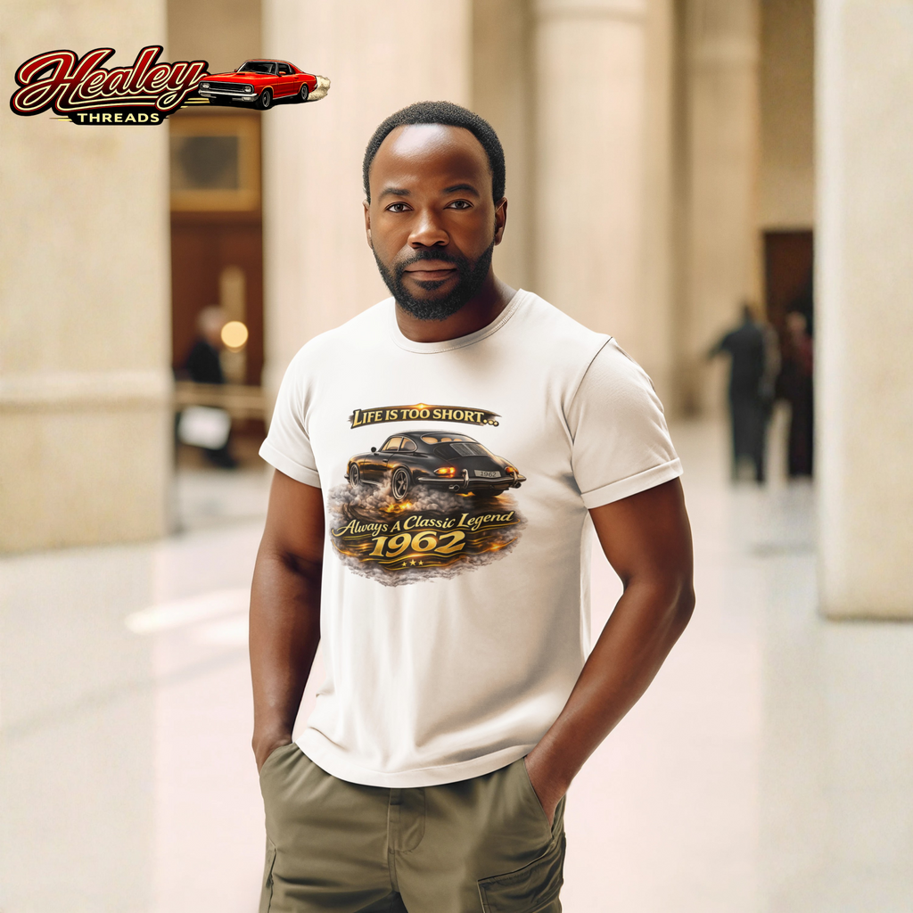 Man wearing a sand t-shirt with a classic car graphic design in a building with columns
