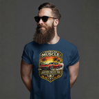 Man wearing a blue t-shirt with 'American Muscle' graphic car design on a dark background