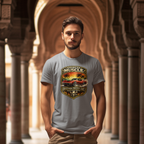Man wearing a sport gray t-shirt with a graphic classic car design in an architectural setting