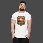 Man wearing a white t-shirt with a classic car graphic design on a gray background