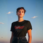 Woman wearing a black t-shirt with a vintage car graphic against a blue sky.