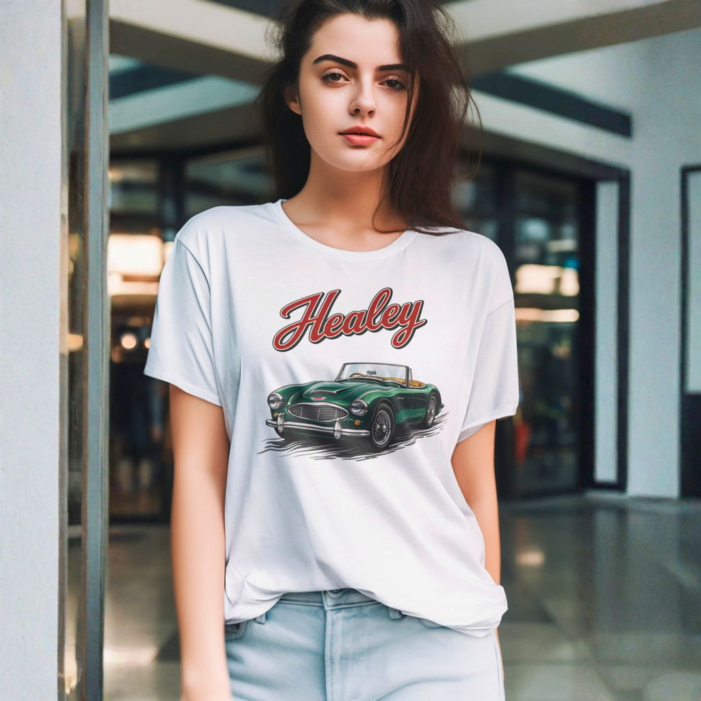 Woman wearing a white t-shirt with a green classic car graphic and 'Healey' text.