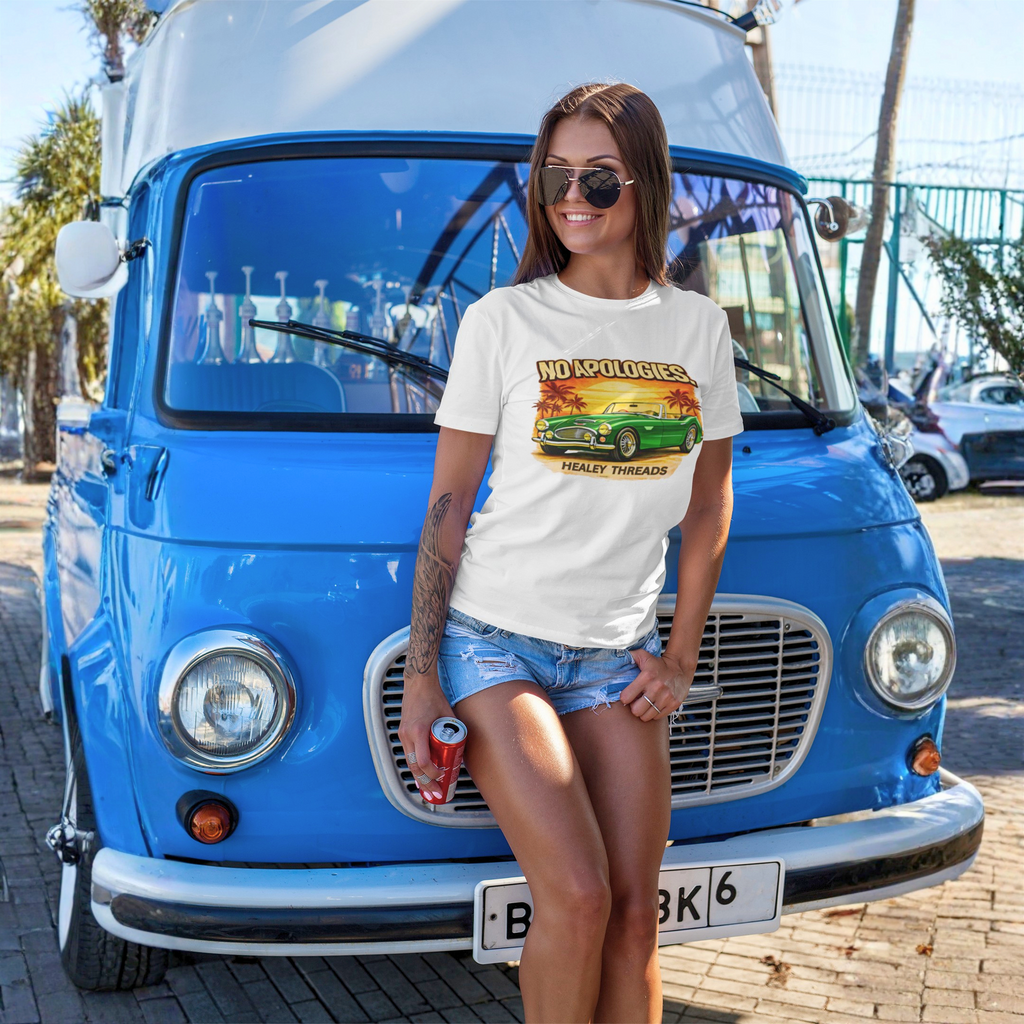 Woman wearing a white t-shirt with a graphic classic car design in front of a blue vintage van.