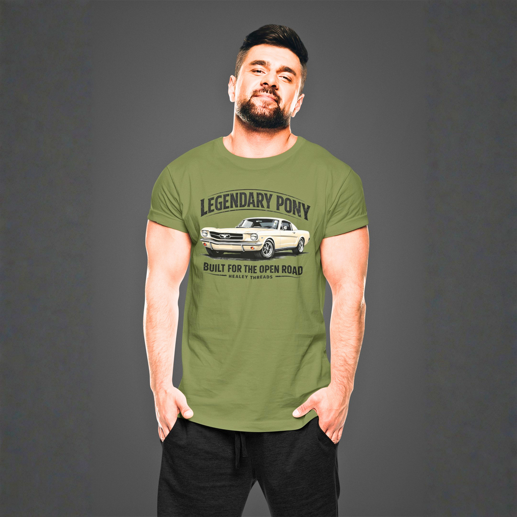 Man wearing a military green t-shirt with a classic car graphic and text on a gray background