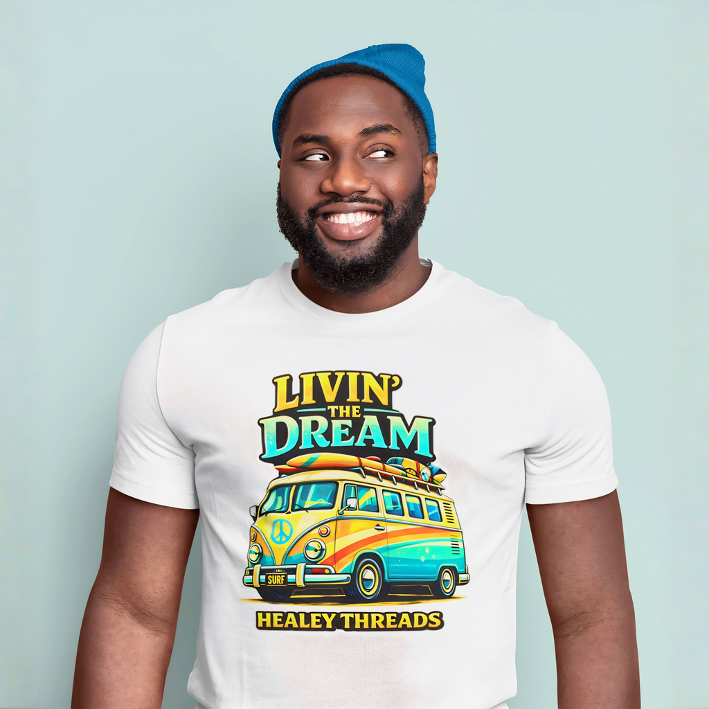 Man wearing a white t-shirt with a colorful van graphic and text, standing against a light blue background.