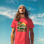 Man wearing a red t-shirt with a graphic Mopar van design against a blue sky.