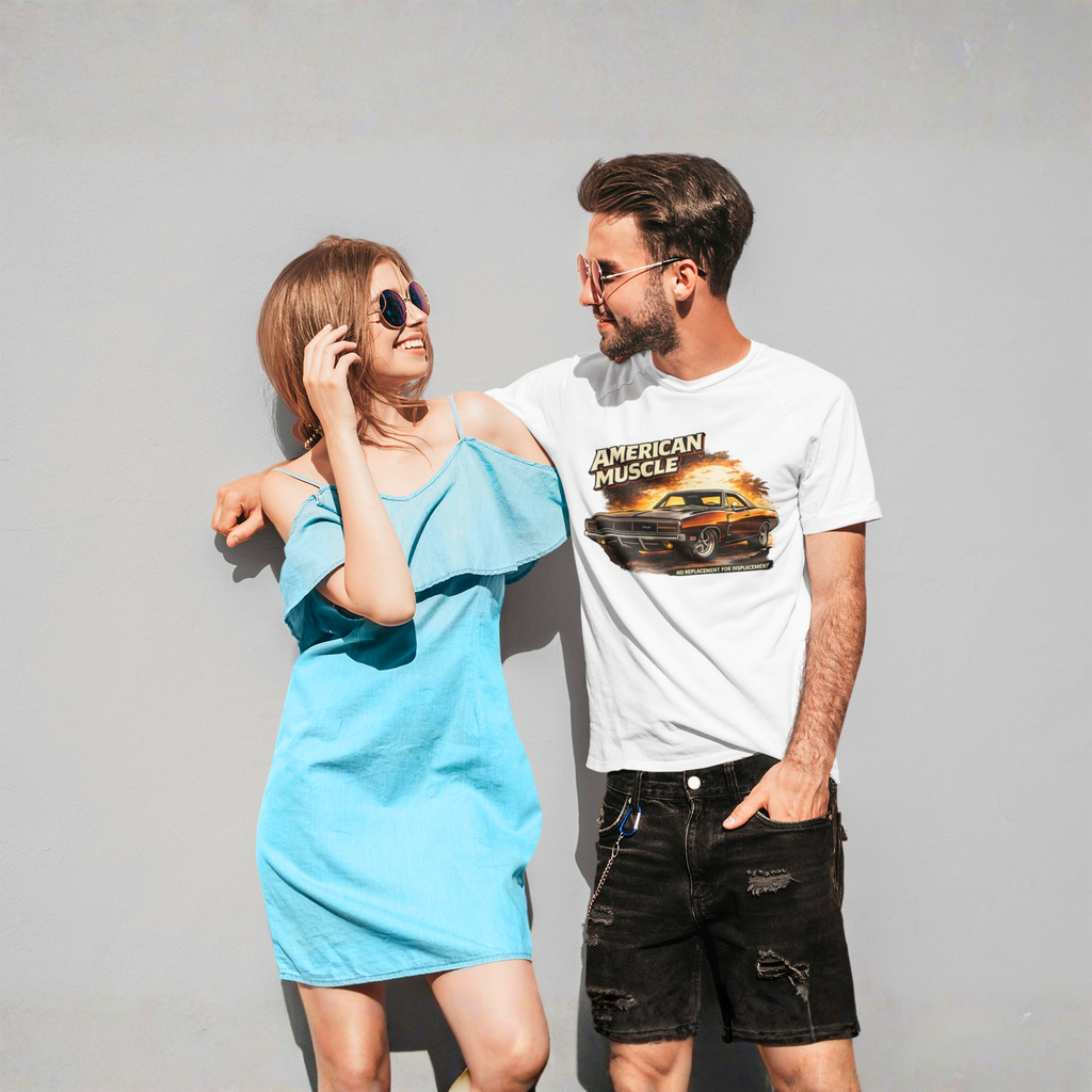 Man and woman standing against a gray background, man wearing a 'American Muscle' t-shirt.