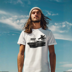 Man wearing a white t-shirt with a graphic design against a blue sky.