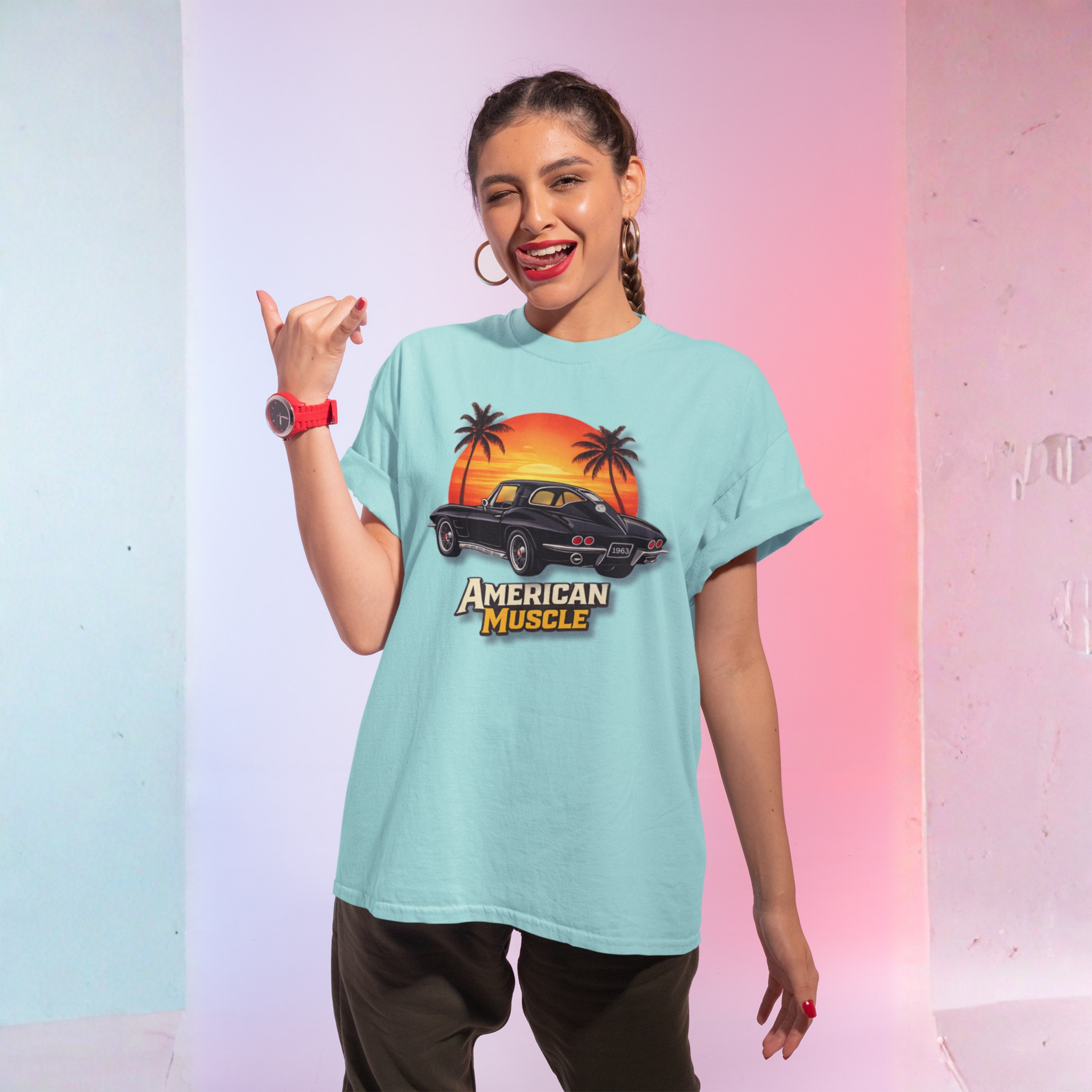 Woman wearing a light blue t-shirt with 'American Muscle' graphic design against a gradient background