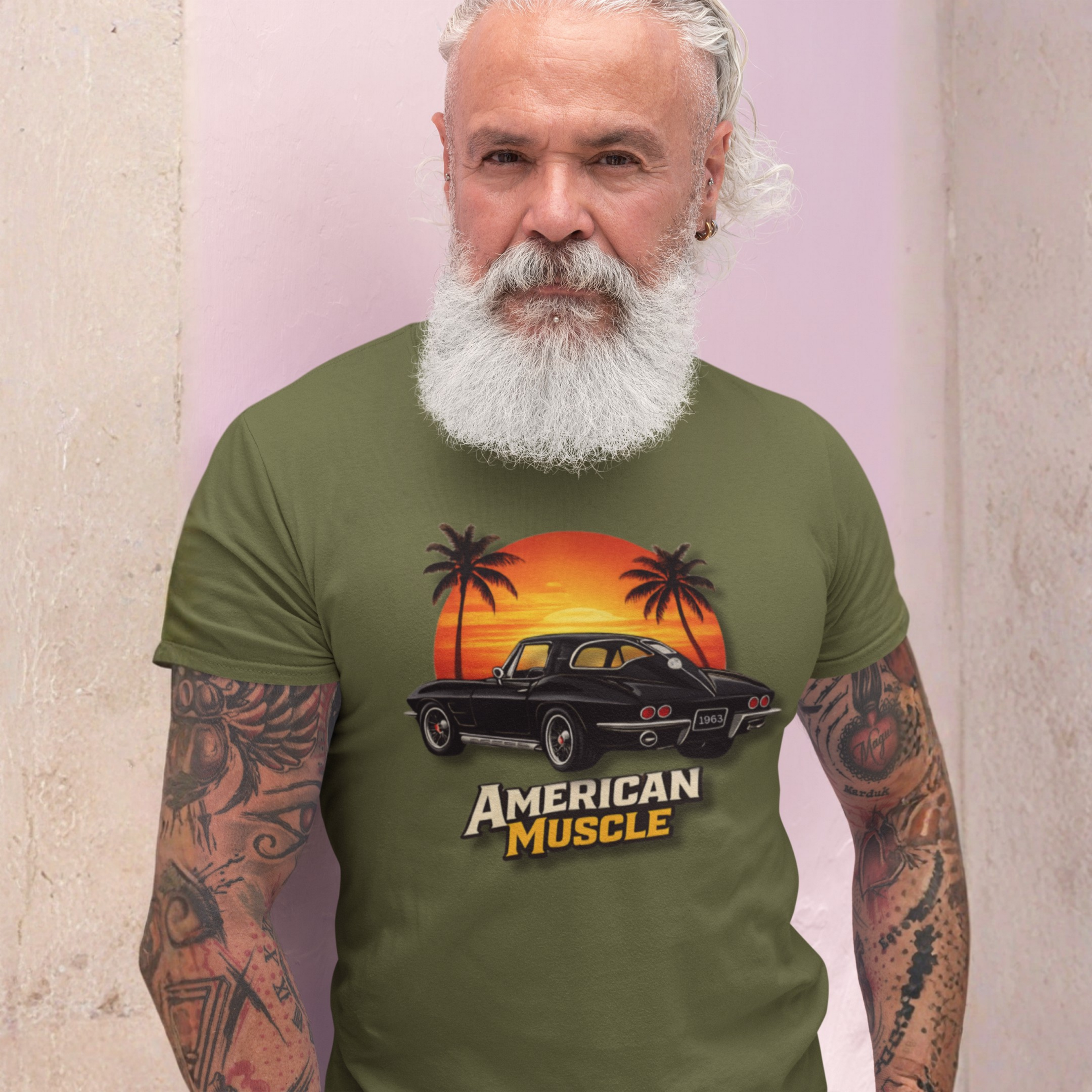 Man wearing a military green t-shirt with 'American Muscle' graphic design.