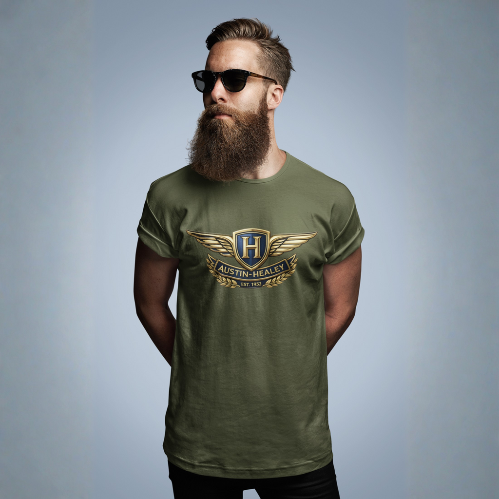 Man wearing a military green t-shirt with a Austin Healey logo on a gray background