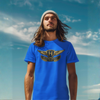 Man wearing a royal blue t-shirt with an Austin-Healey logo against a blue sky.