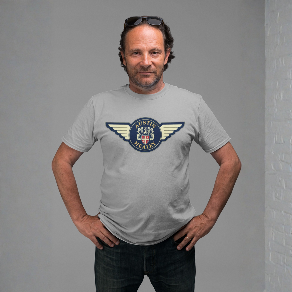 Man wearing a sport gray t-shirt with a Austin Healey logo on a gray background