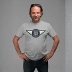 Man wearing a sport gray t-shirt with a Austin Healey logo on a gray background