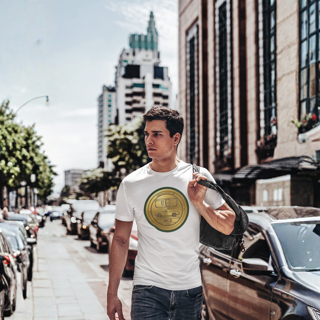 Man walking on a city street wearing a white t-shirt with a a classic car coin design.