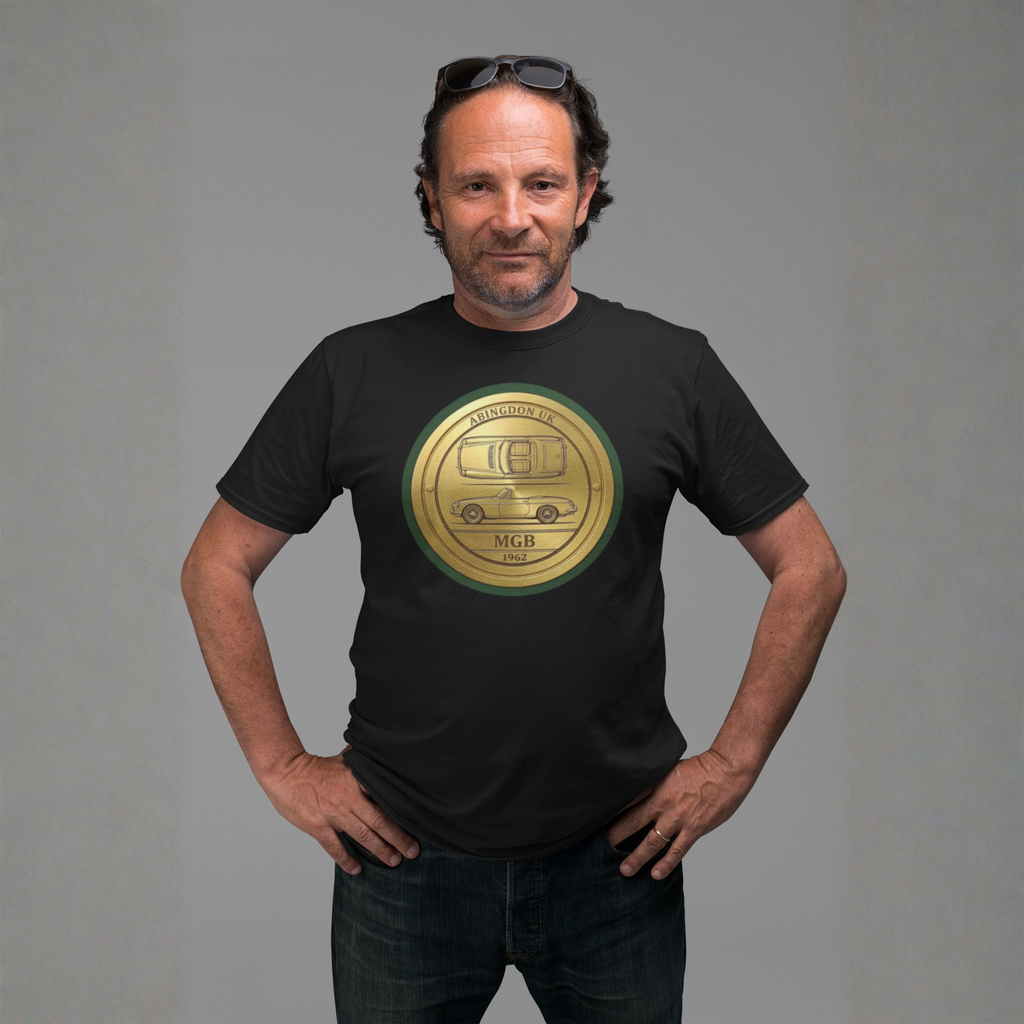 Man wearing a black t-shirt with a gold classic car emblem on a gray background