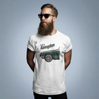 Man wearing a white t-shirt with a classic car graphic design and text, standing against a plain background