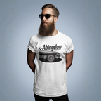 Man wearing a white t-shirt with 'Abingdon' and classic car graphic on a gray background
