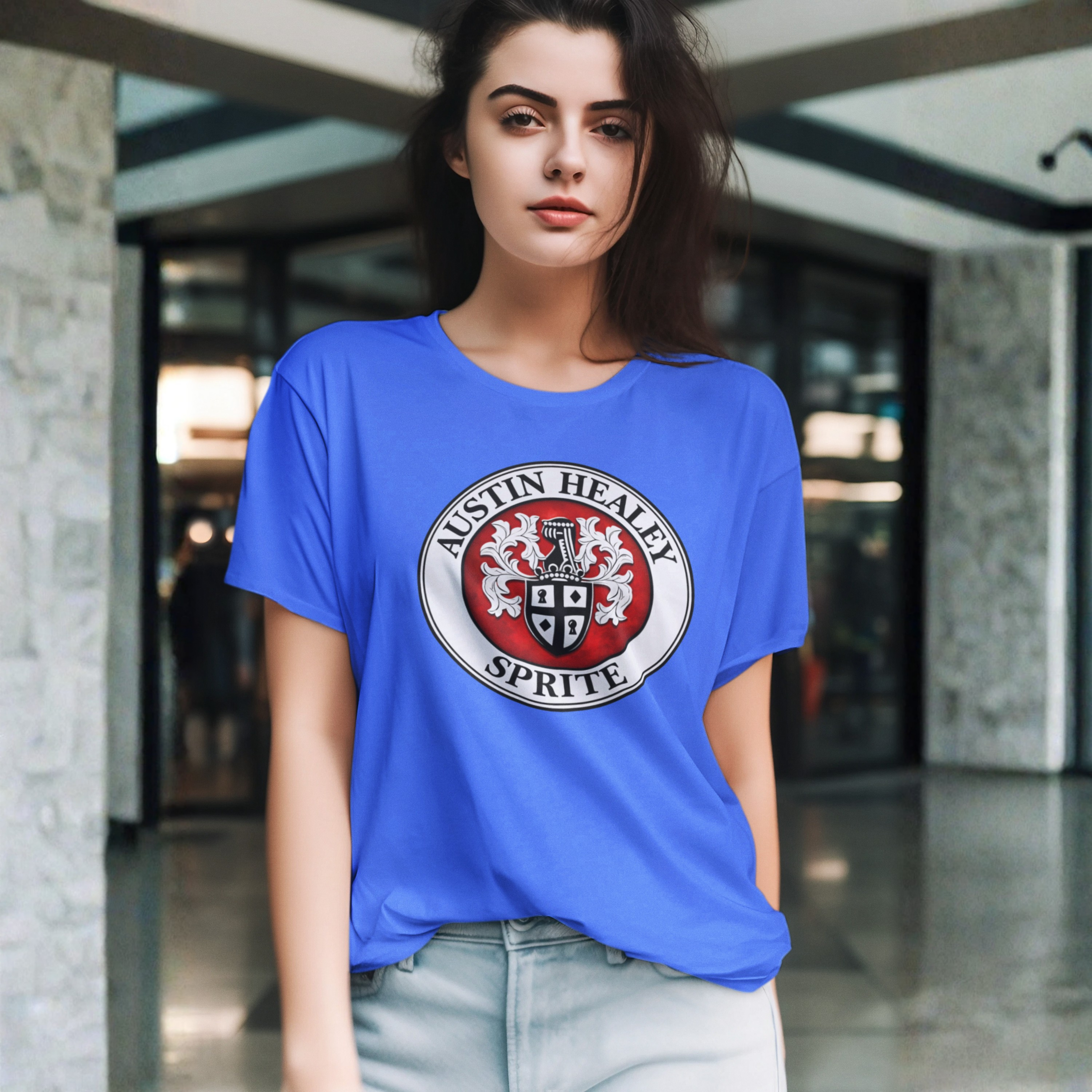 Woman wearing a blue t-shirt with Austin Healey Sprite logo
