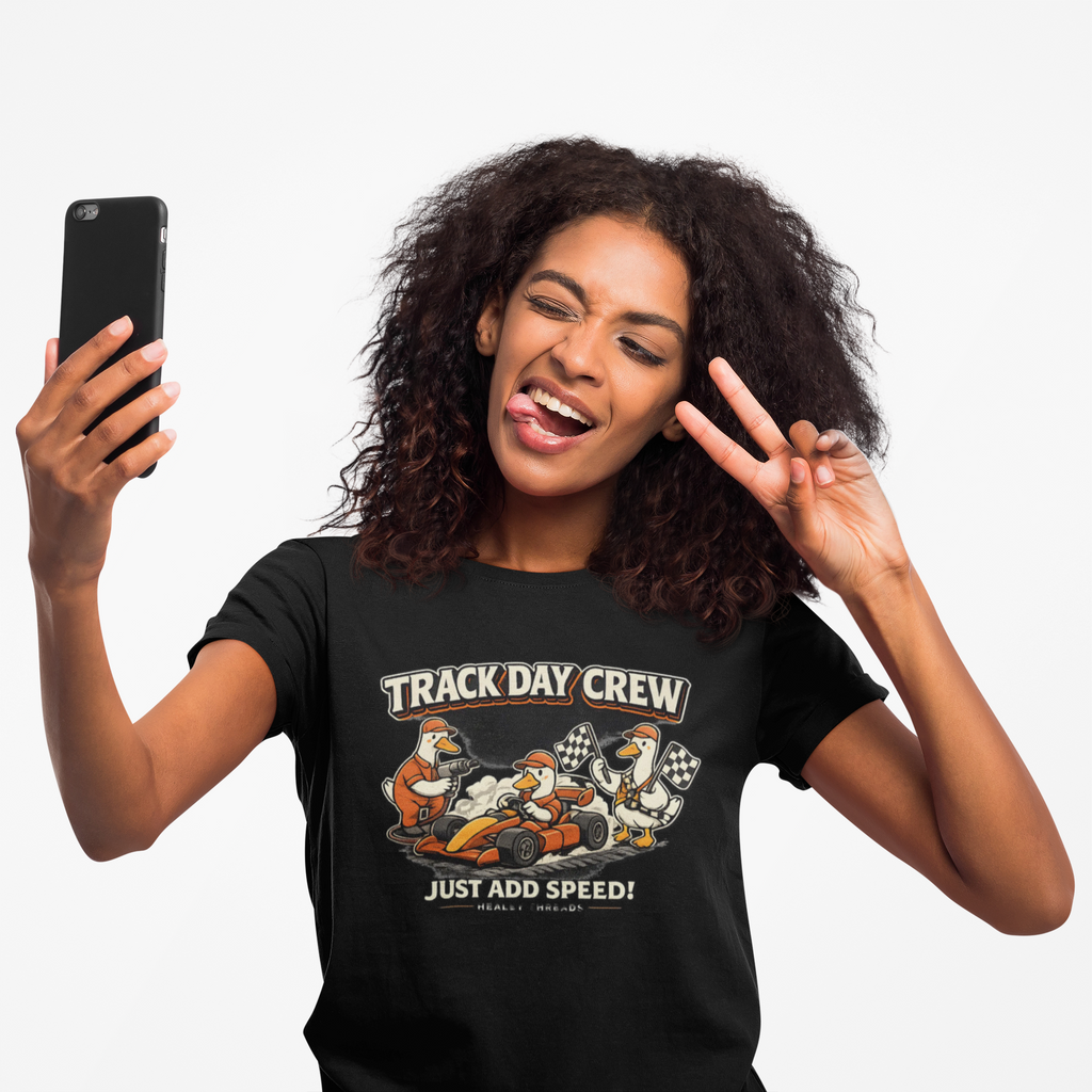 Girl wearing a black t-shirt with 'Track Day Crew' graphic on a white background