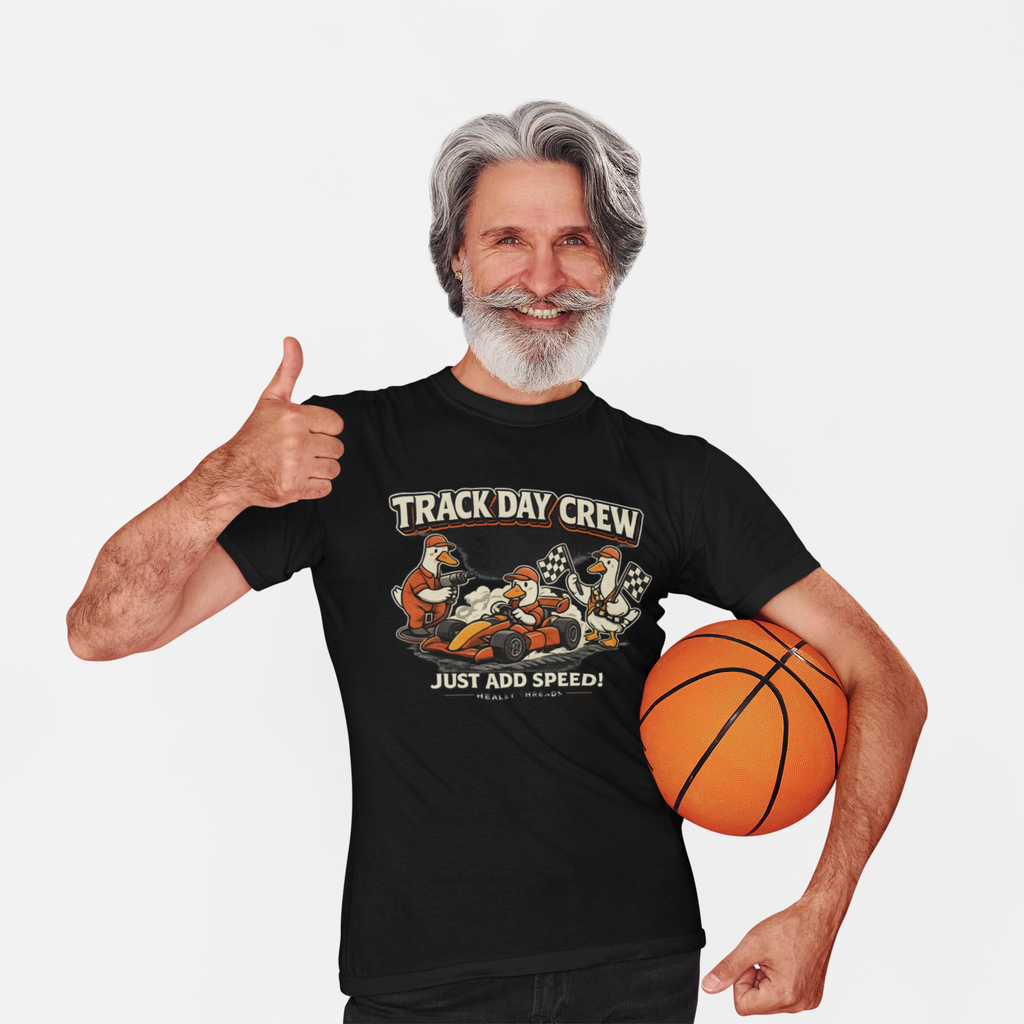 Man wearing a black t-shirt with 'Track Day Crew' design, holding a basketball, on a white background
