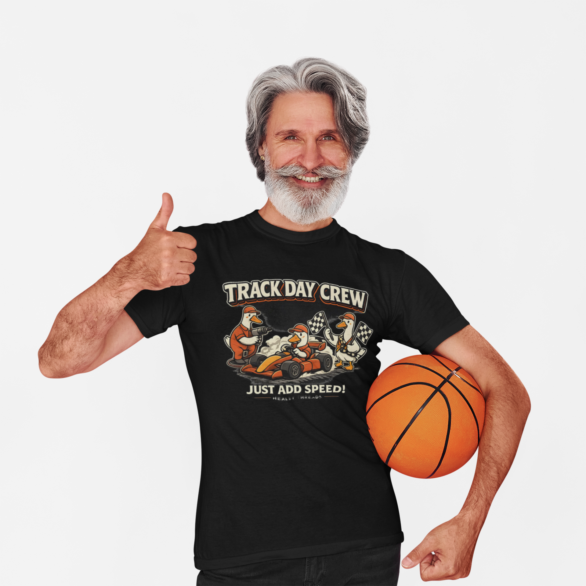 Man wearing a black t-shirt with 'Track Day Crew' design, holding a basketball, on a white background