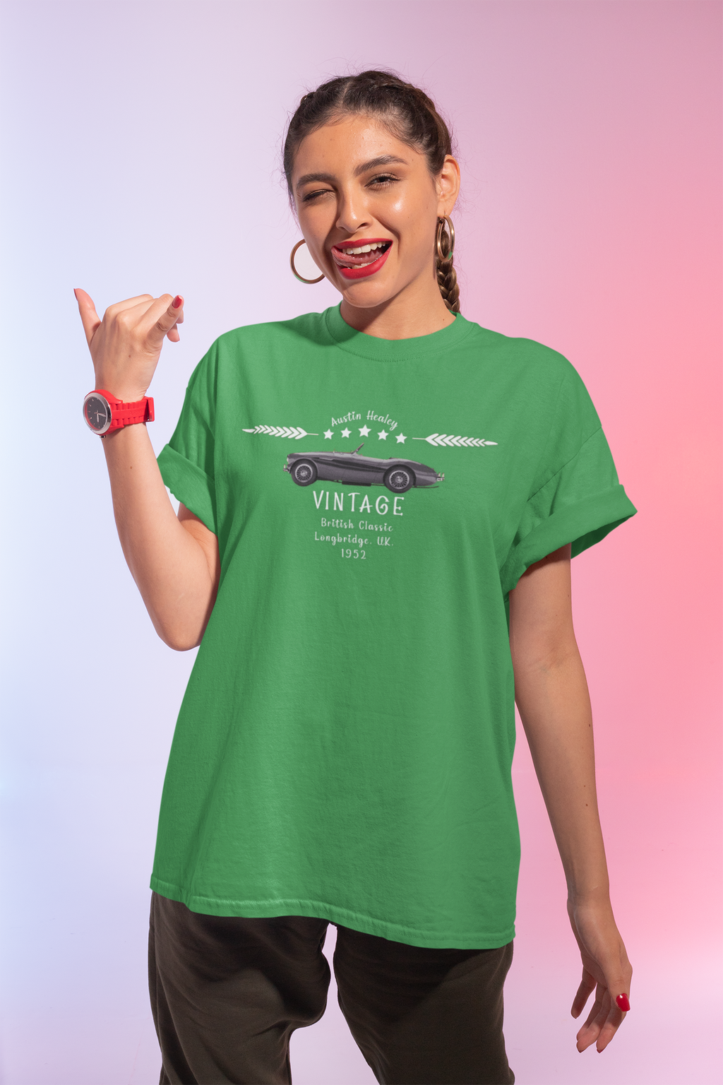 Woman wearing a Irish green t-shirt with a graphic car design on a gradient background