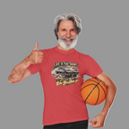 Man wearing a heather red t-shirt with a classic car graphic design, giving a thumbs up and holding a basketball.