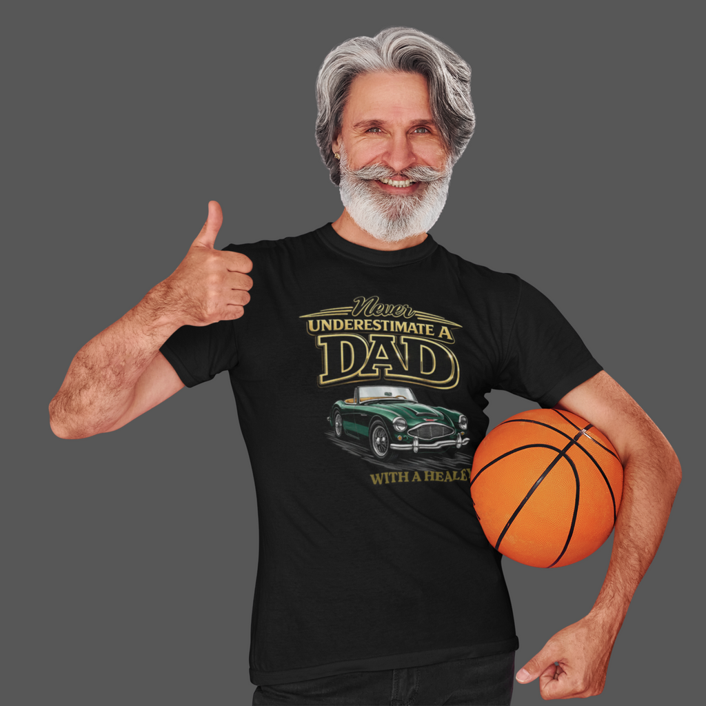 Man giving a thumbs up and holding a basketball, wearing a black t-shirt with a classic car graphic design.