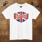 White t-shirt with British flag design and 'BRITISH' text on a wooden surface with sunglasses and keychain.